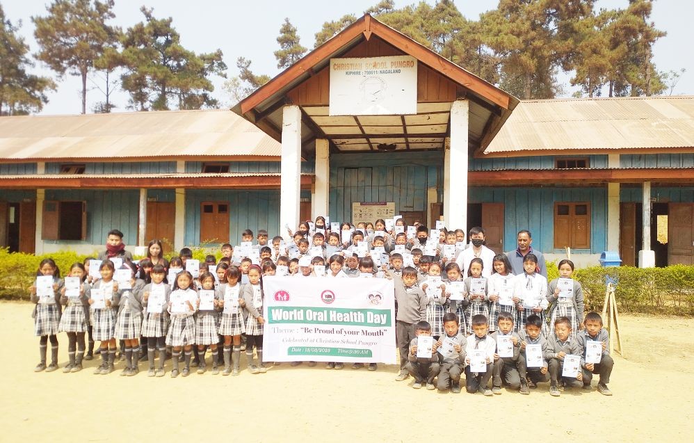 Dr Weri Mero and his staff along with the teachers and students after the oral health awareness camp at Christian School, Pungro on March 13.